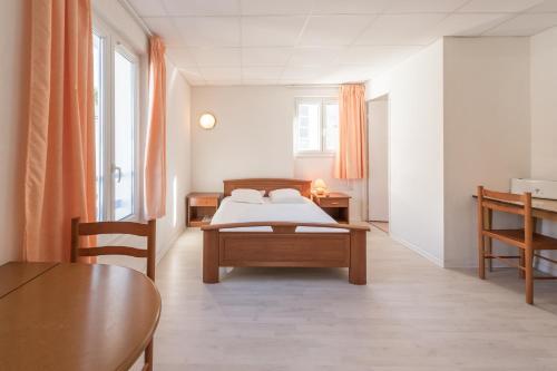 Foto de una habitación de City Résidence Termalia