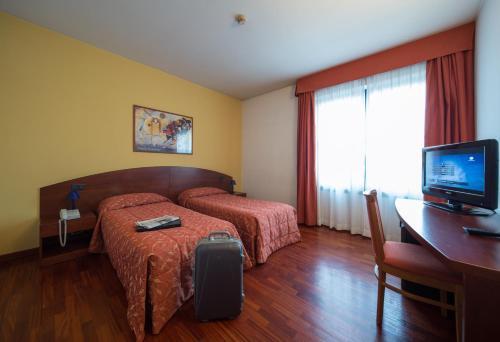 Foto de una habitación de Hotel La Cascata