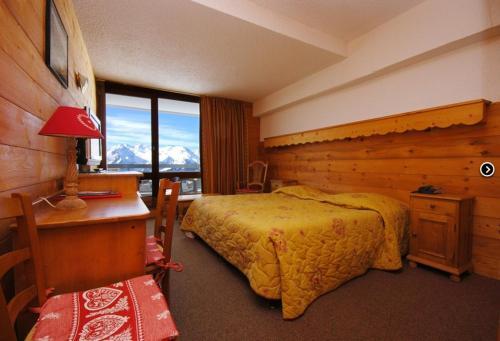 Foto de una habitación de Hotel Le Dôme