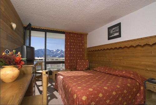 Foto de una habitación de Hotel Le Dôme