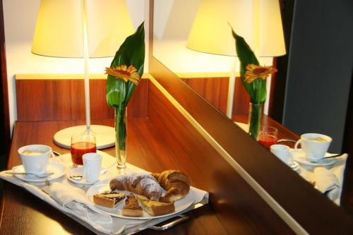 Foto de una habitación de Delfina Palace Hotel