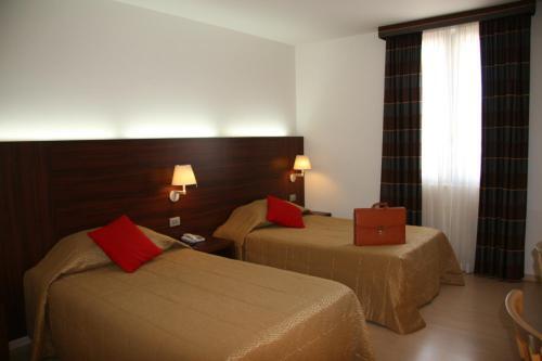 Foto de una habitación de Delfina Palace Hotel
