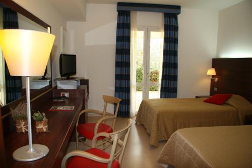 Foto de una habitación de Delfina Palace Hotel