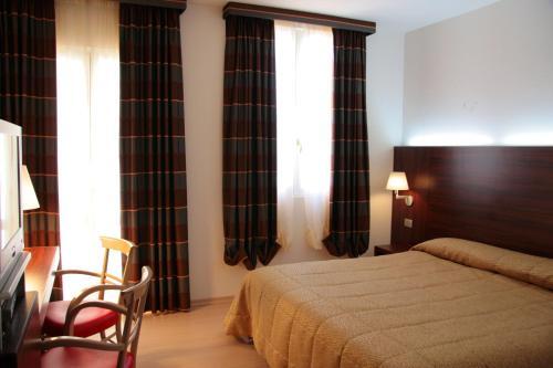 Foto de una habitación de Delfina Palace Hotel
