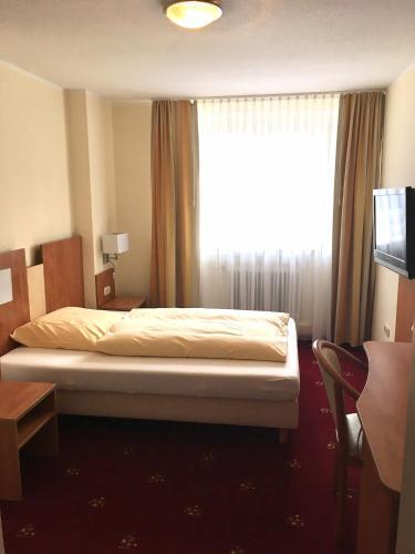 Foto de una habitación de tauwerk Hotel