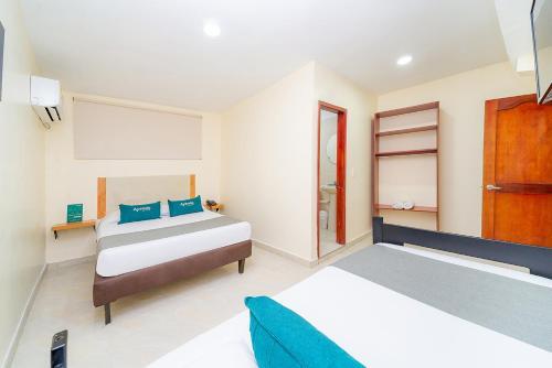 Foto de una habitación de Hotel Baly Express