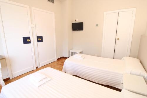 Foto de una habitación de Hostal Nuevo Tropical