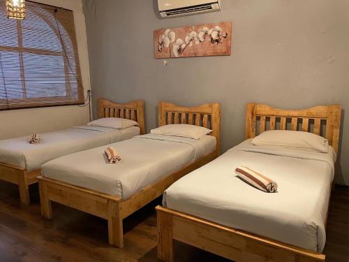 Foto de una habitación de Layang Layang Guest House Melaka