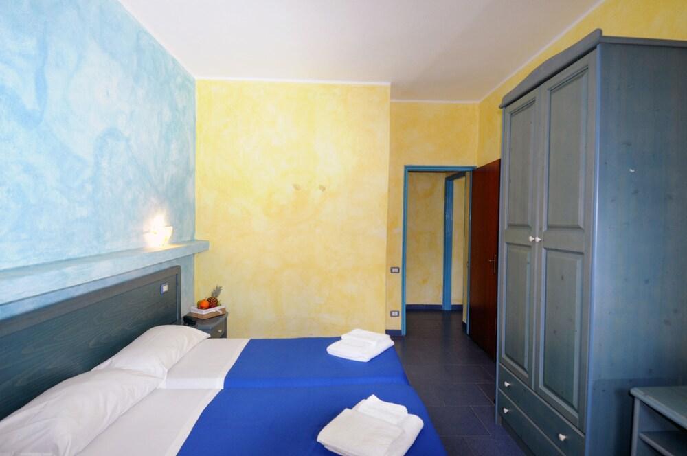 Foto de una habitación de Oasi Azzurra Village