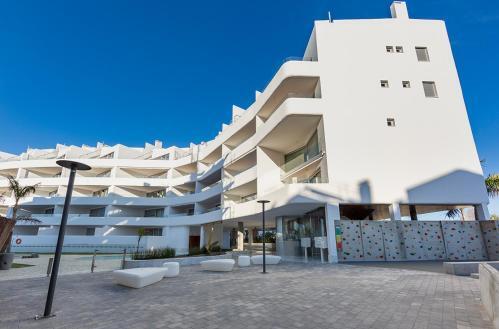 Foto de una habitación de Apartamentos Homity Exclusive Playa Granada Beach &amp;amp; Golf - Mar de Astrid