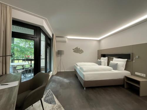 Foto de una habitación de Seehotel am Tankumsee
