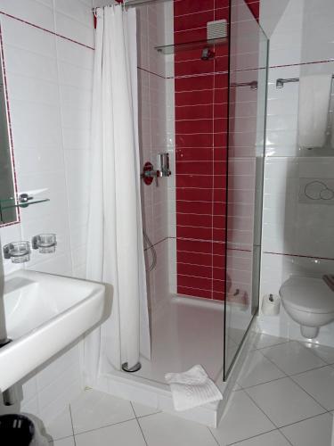 Foto de una habitación de Stadthotel Langenfeld