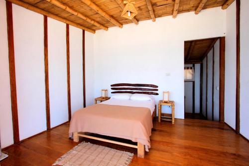 Foto de una habitación de Hoja de Palma Bungalows