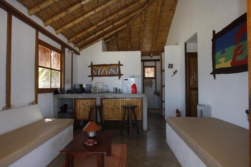 Foto de una habitación de Hoja de Palma Bungalows