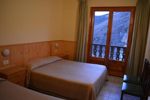 Foto de una habitación de Hostal La Neu
