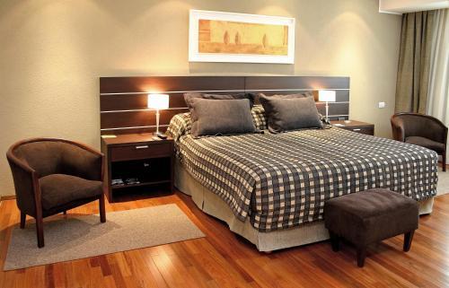 Foto de una habitación de Hotel Orfeo Suites Cordoba