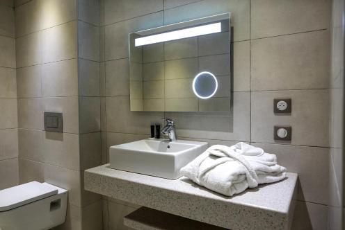 Foto de una habitación de Radisson Serviced Apartments Antananarivo City Centre