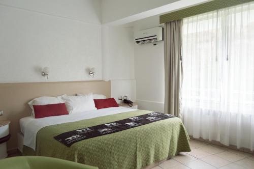 Foto de una habitación de Hotel Puente Nacional &amp;amp; Spa