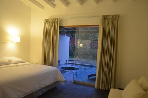 Foto de una habitación de Hotel Empedrada Ranch &amp;amp; Lodge