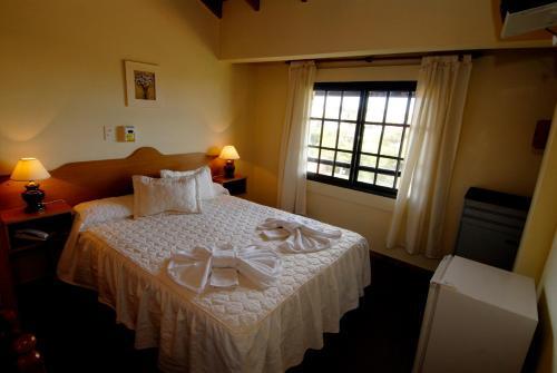 Foto de una habitación de Hotel Pinar Del Sol