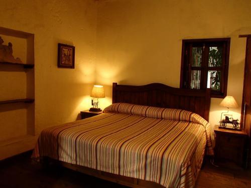 Foto de una habitación de Hotel La Casa de Piedra