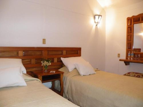 Foto de una habitación de Hotel Meson Yohualichan