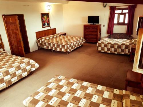 Foto de una habitación de Hotel Meson Yohualichan