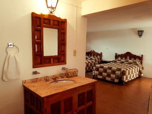 Foto de una habitación de Hotel Meson Yohualichan