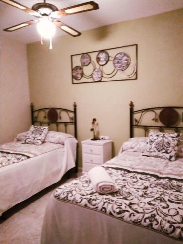 Foto de una habitación de Apartamento Turistico La Victoria