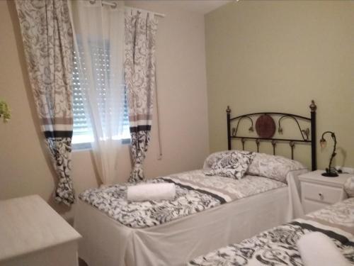 Foto de una habitación de Apartamento Turistico La Victoria