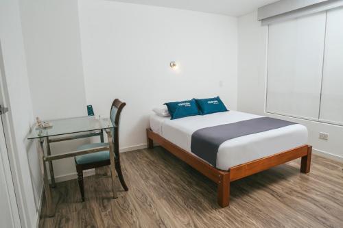 Foto de una habitación de Ayenda Alma Casa Boutique