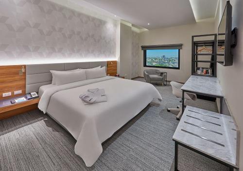 Foto de una habitación de Radisson Hotel Monterrey San Jeronimo