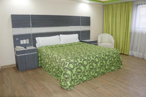 Foto de una habitación de Hotel Corona Real