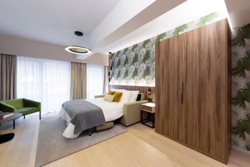 Foto de una habitación de The Central Kirchberg - Smart ApartHotel
