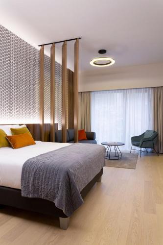 Foto de una habitación de The Central Kirchberg - Smart ApartHotel
