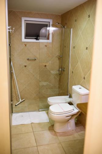 Foto de una habitación de AVEMAR Apart Hotel
