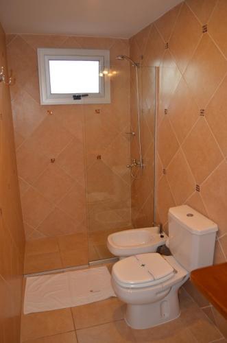 Foto de una habitación de AVEMAR Apart Hotel