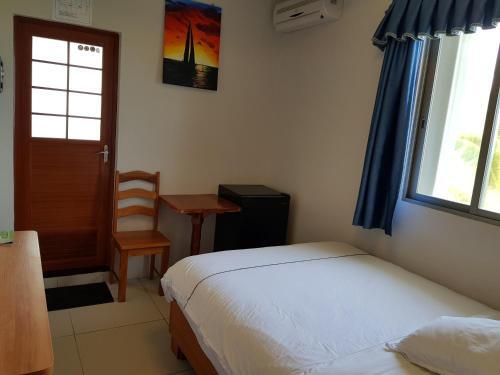 Foto de una habitación de Caye Caulker Beach Hotel
