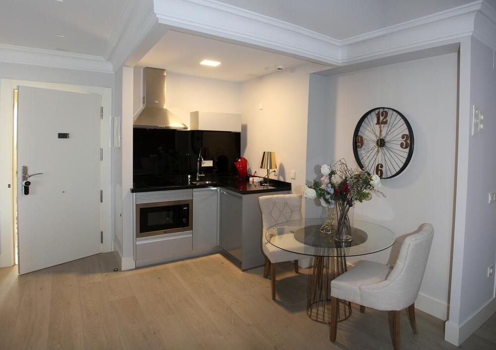 Foto de una habitación de Apartamentos Principia Suites