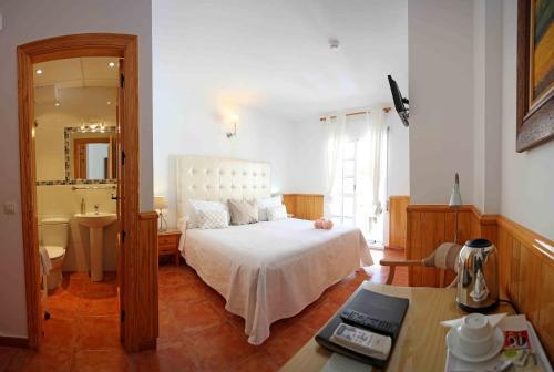 Foto de una habitación de Hotel Casa Rosa
