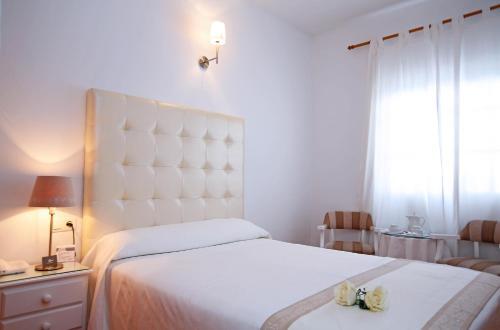 Foto de una habitación de Hotel Casa Rosa
