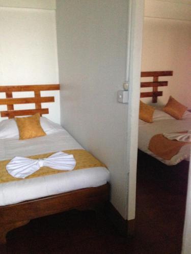 Foto de una habitación de Hotel Don Robert