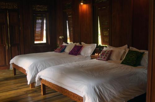 Foto de una habitación de Lanna Ban Hotel