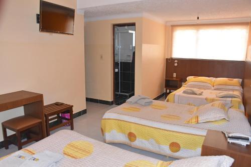 Foto de una habitación de Hotel Mitru