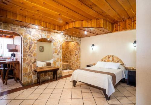 Foto de una habitación de Hotel Cibeles Resort