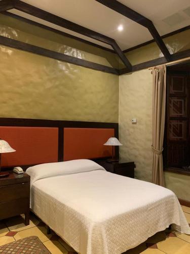 Foto de una habitación de Hotel 1915 INN &amp;amp; SUITES