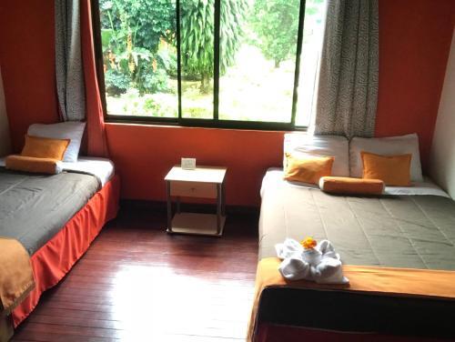 Foto de una habitación de Hotel Your House