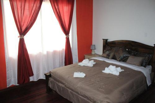 Foto de una habitación de Hotel Your House
