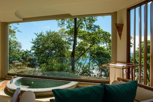 Foto de una habitación de Complejo Arenas Del Mar Beachfront &amp;amp; Rainforest Resort