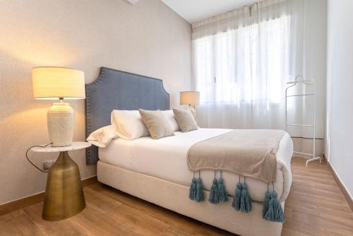 Foto de una habitación de Apartamentos Genteel Home Recaredo